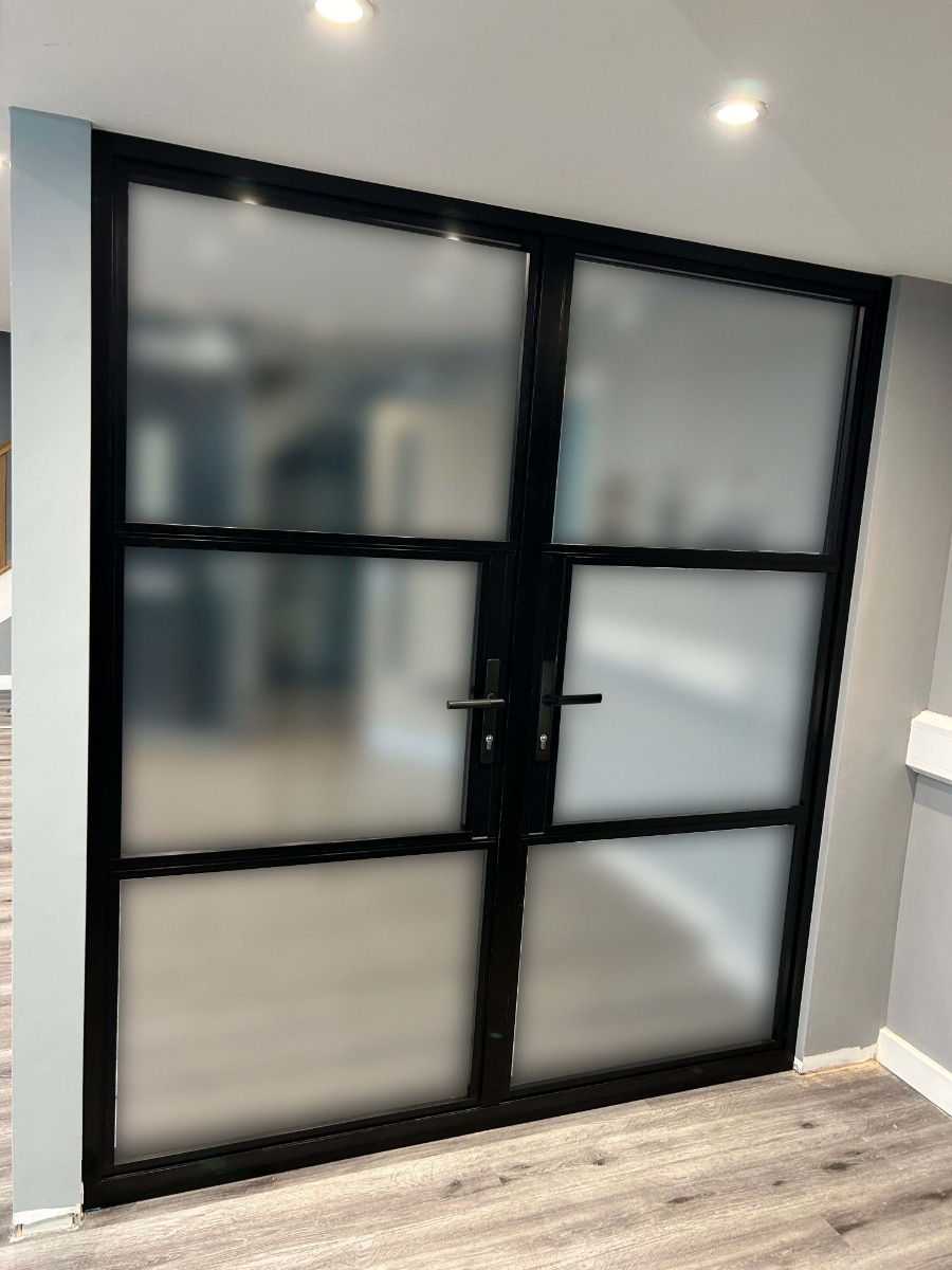 Regal Hardware Knurled handles look the part on classic steel-look doors